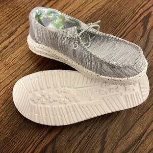 Hey Dude slip on shoes in marled grey with green and grey speckled soles